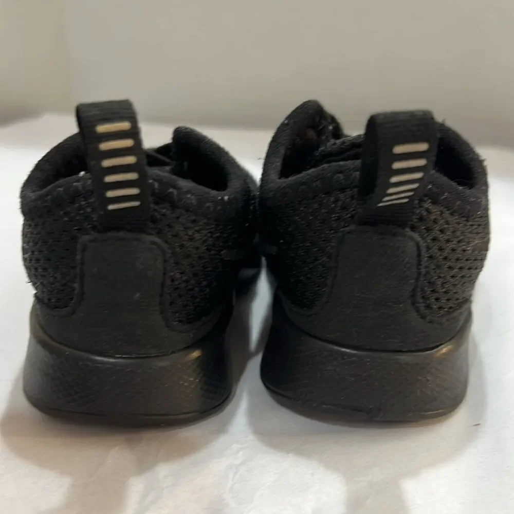 Nike Black pull on sneakers size 4C NWOT